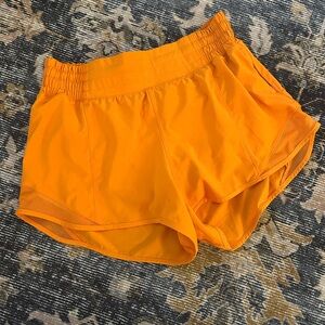Lululemon Athletically Bright Orange Hotty Hot Athletic Shorts